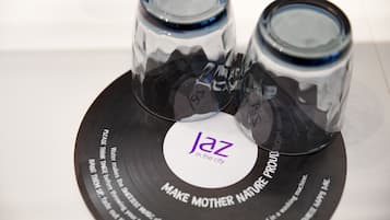 A vinyl record with a label that reads "jaz in the city" and the phrase "MAKE MOTHER NATURE PROUIL".