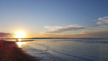 Enjoy the expansive beach with access to the ocean.