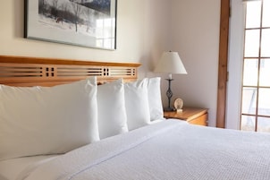 Cortinas blackout, Wi-Fi de cortesia, roupa de cama