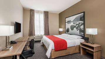 Chambre, 1 grand lit, accessible aux personnes à mobilité réduite, non-fumeurs | Bureau, fer et planche à repasser, Wi-Fi, draps fournis