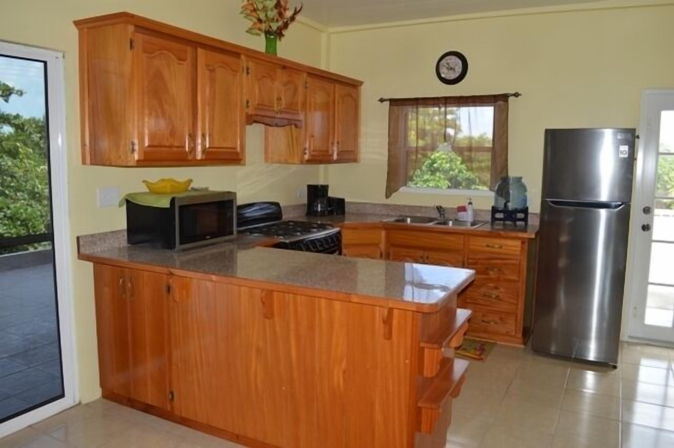 Apartment, 2 Bedrooms | Private kitchen | Full-sized fridge, microwave, oven, stovetop