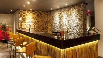 3 bars/lounges, poolside bar