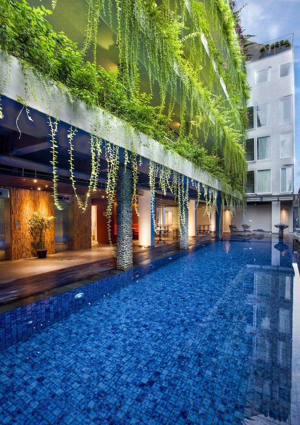 Outdoor pool, pool umbrellas, sun loungers