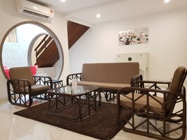 Villa 8M (100m from hotel) | Living area | Flat-screen TV