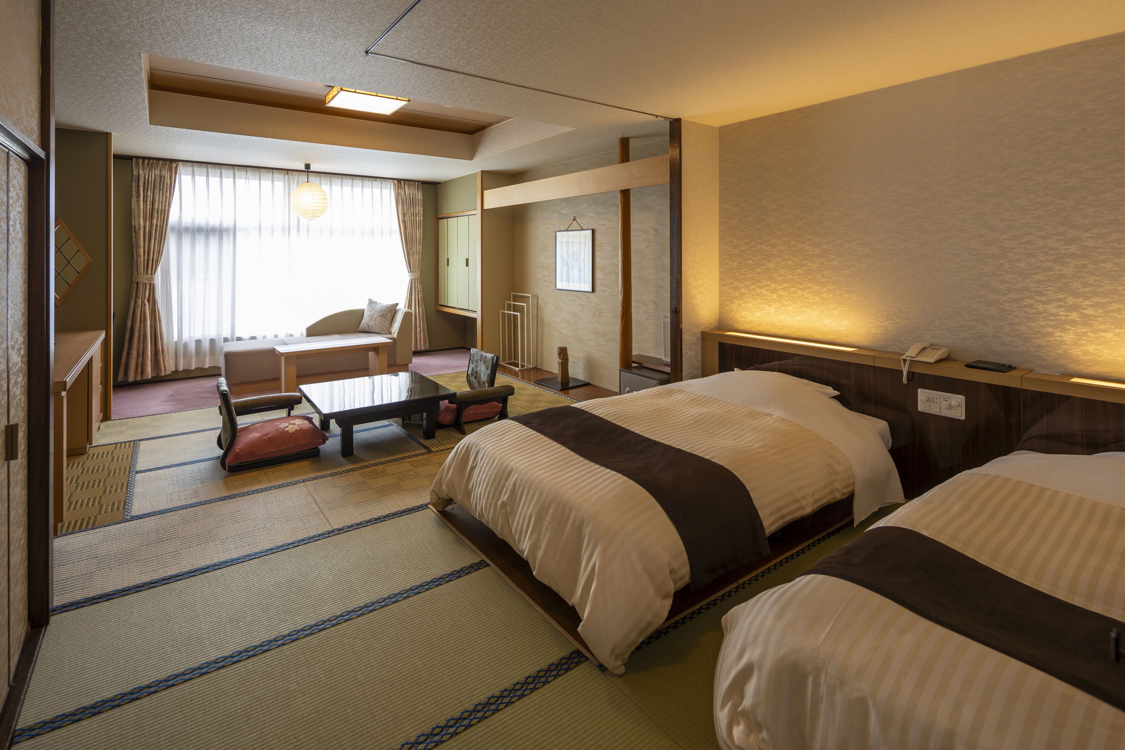 standard japanese western room, non smoking, lake view (beds + japanese futons) | 1 bedroom, in-room safe, individually decorated, desk