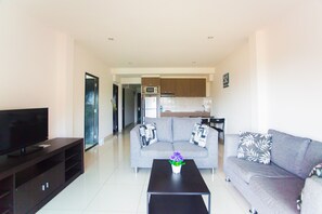 Suite ejecutiva, 3 habitaciones, balcón | Caja fuerte, tabla de planchar con plancha, camas supletorias