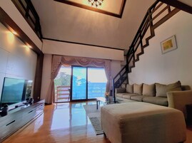 Luxury Apartment, Balcony, Park View | Living area | Flat-screen TV, DVD player