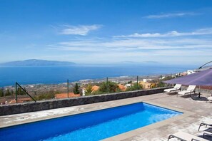Outdoor pool, pool umbrellas, pool loungers