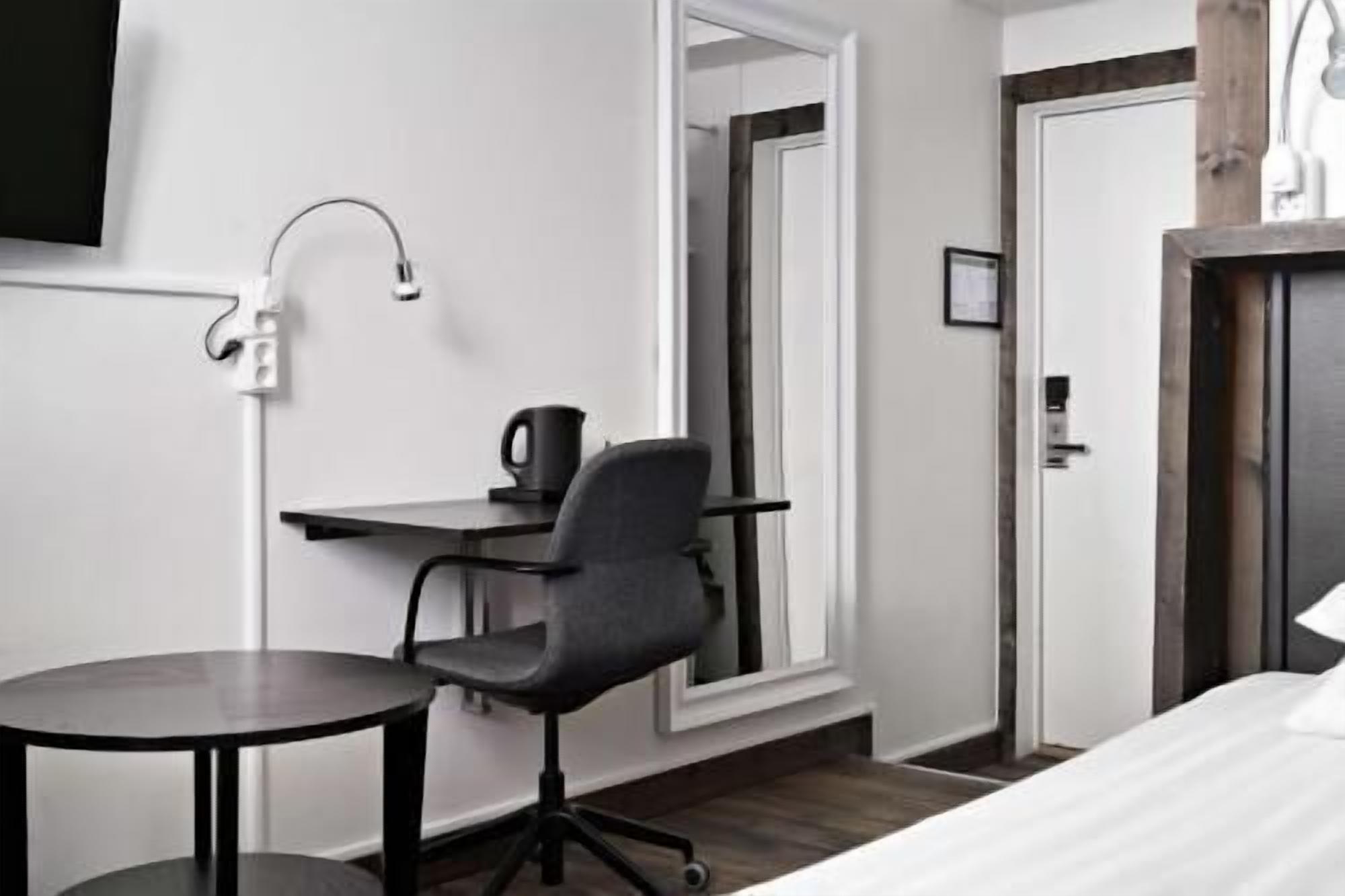 Individually decorated, individually furnished, desk, blackout drapes