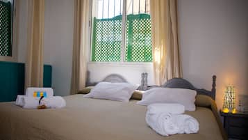 16 chambres, couette en duvet d'oie, fer et planche Ă repasser