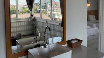 Premium vierpersoonskamer | Een minibar, individueel gedecoreerd, individueel gemeubileerd