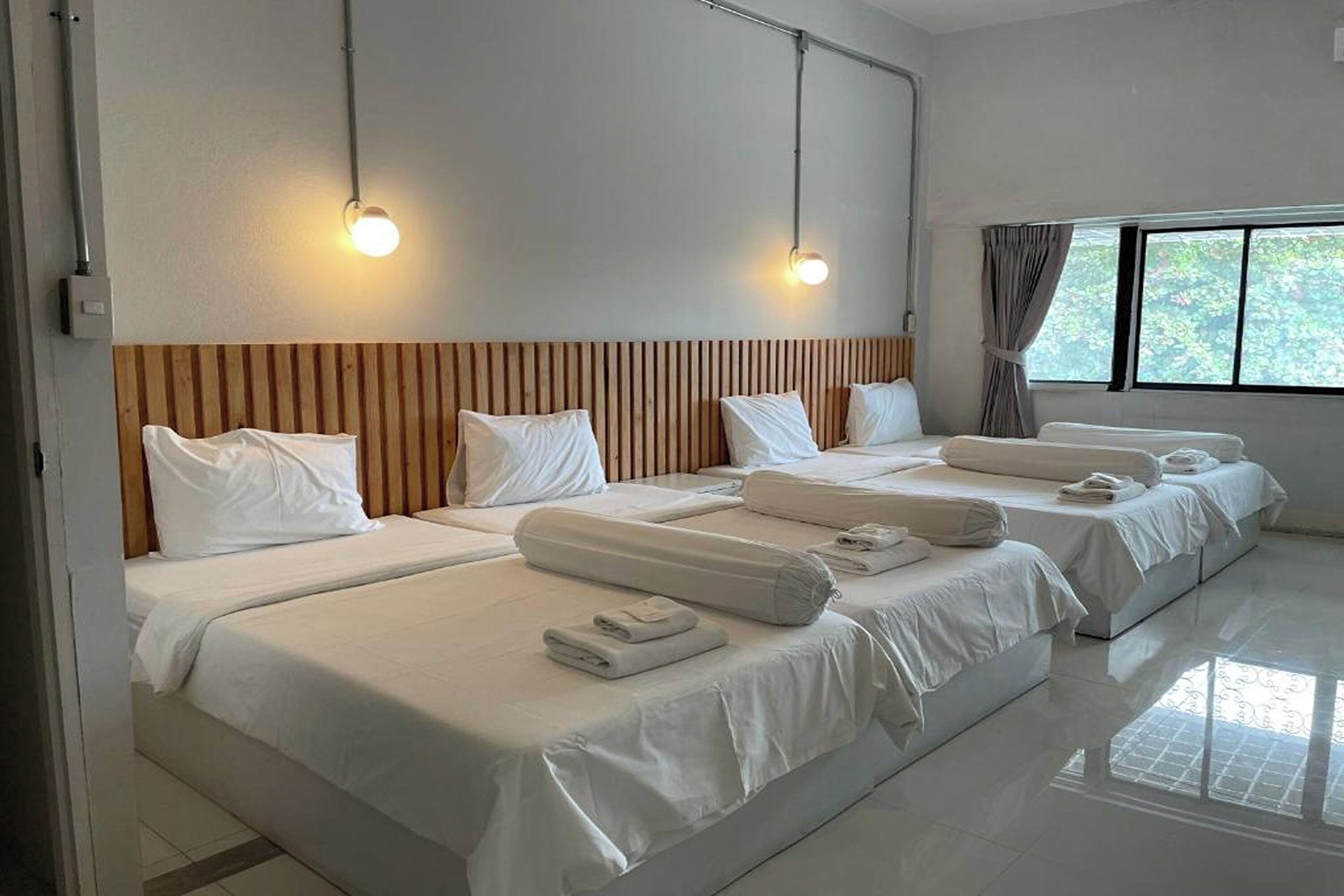 Vierpersoonskamer | Een minibar, individueel gedecoreerd, individueel gemeubileerd