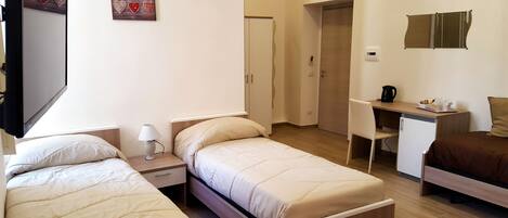 Triple Room (Napul'è) | Premium bedding, memory foam beds, minibar, in-room safe