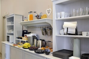 Microwave, coffee/tea maker, electric kettle, cookware/dishes/utensils
