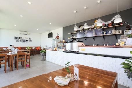 Lunch and dinner served, Thai cuisine. The Garage