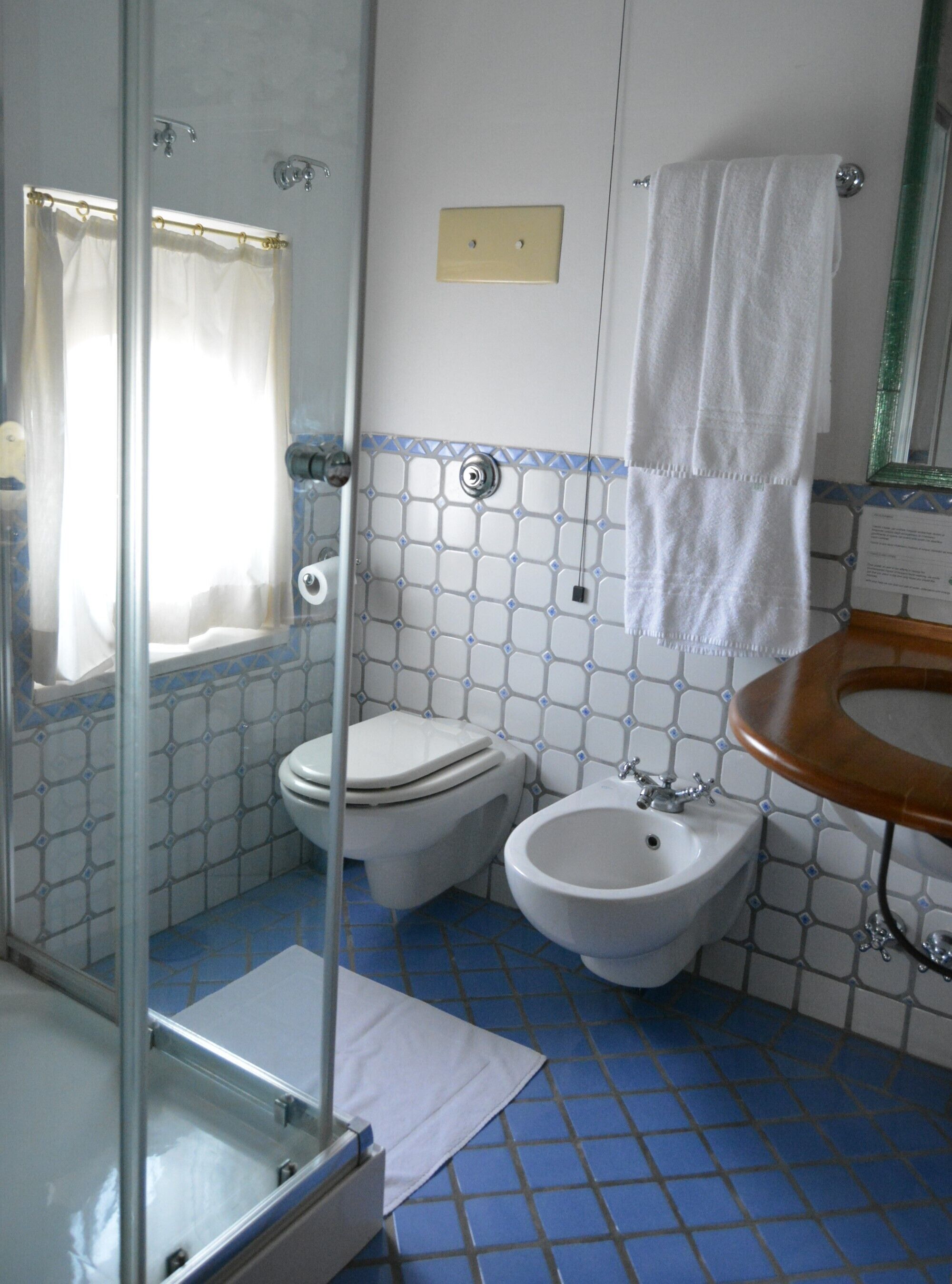 junior suite | bathroom | shower, hair dryer, towels