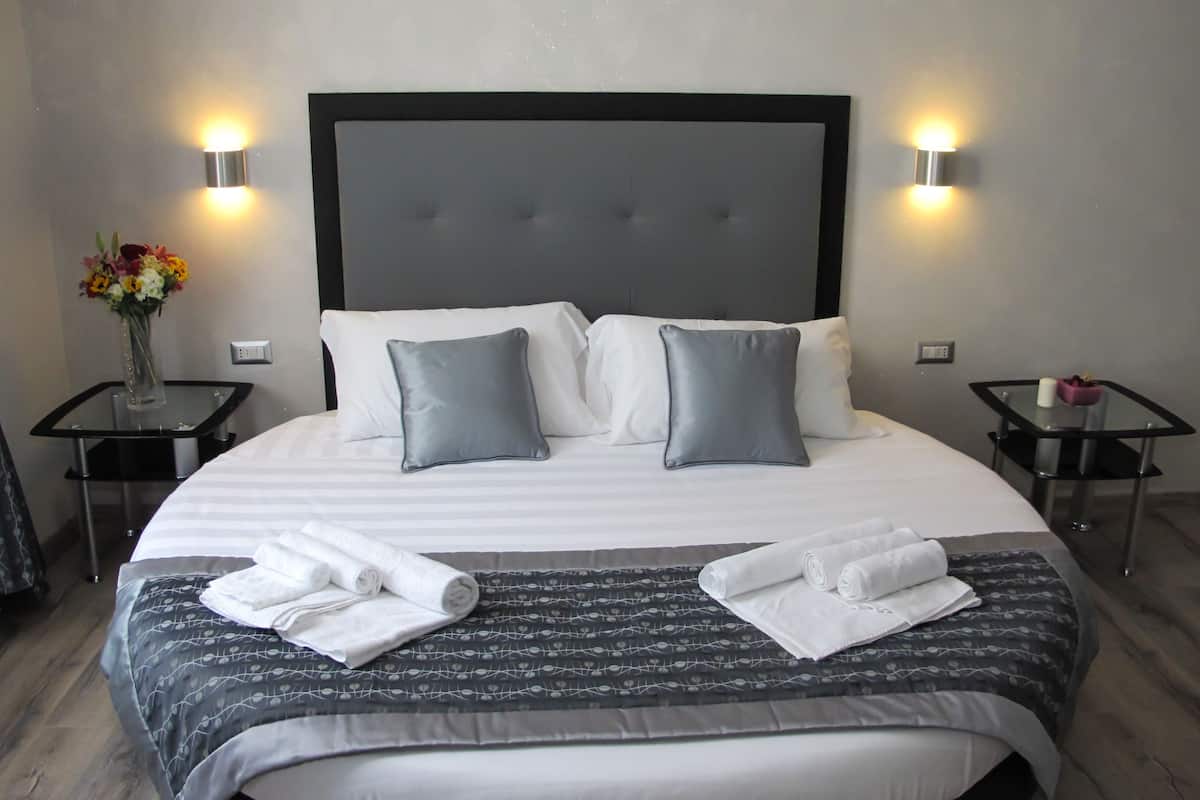 1 habitación, ropa de cama de alta calidad y minibar