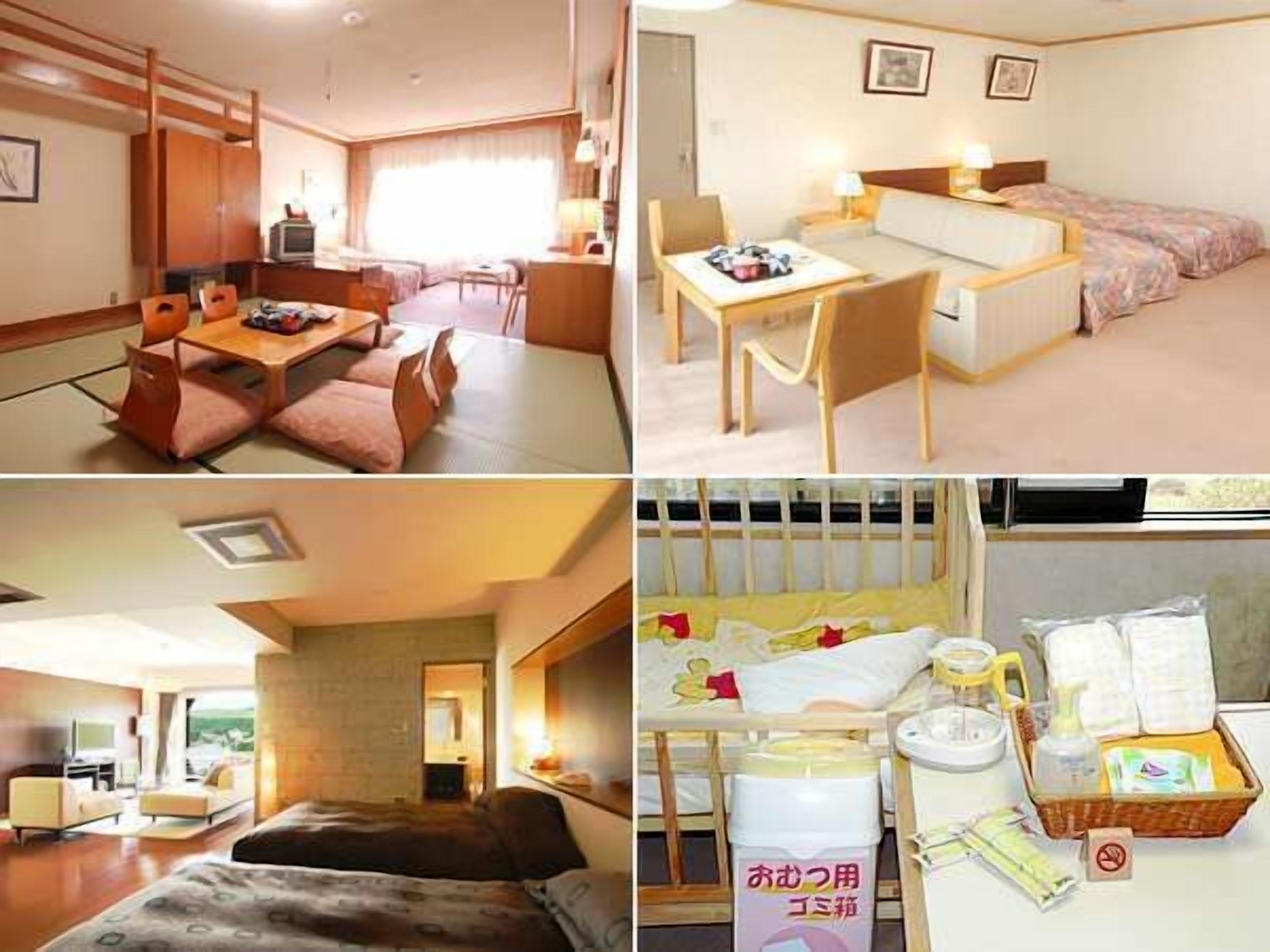 A hotel room with a dining area, a sofa, a bed, and a bathroom with toiletries.