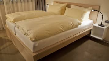 Premium bedding, desk, blackout curtains, soundproofing