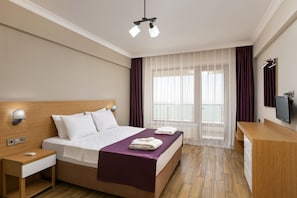 Premium bedding, desk, soundproofing, iron/ironing board
