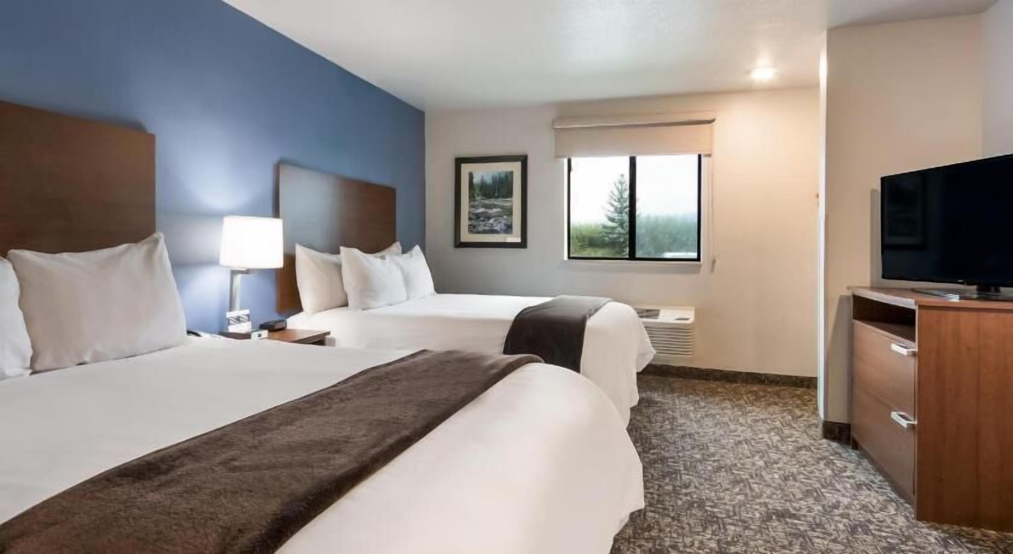 Premium bedding, pillowtop beds, desk, laptop workspace