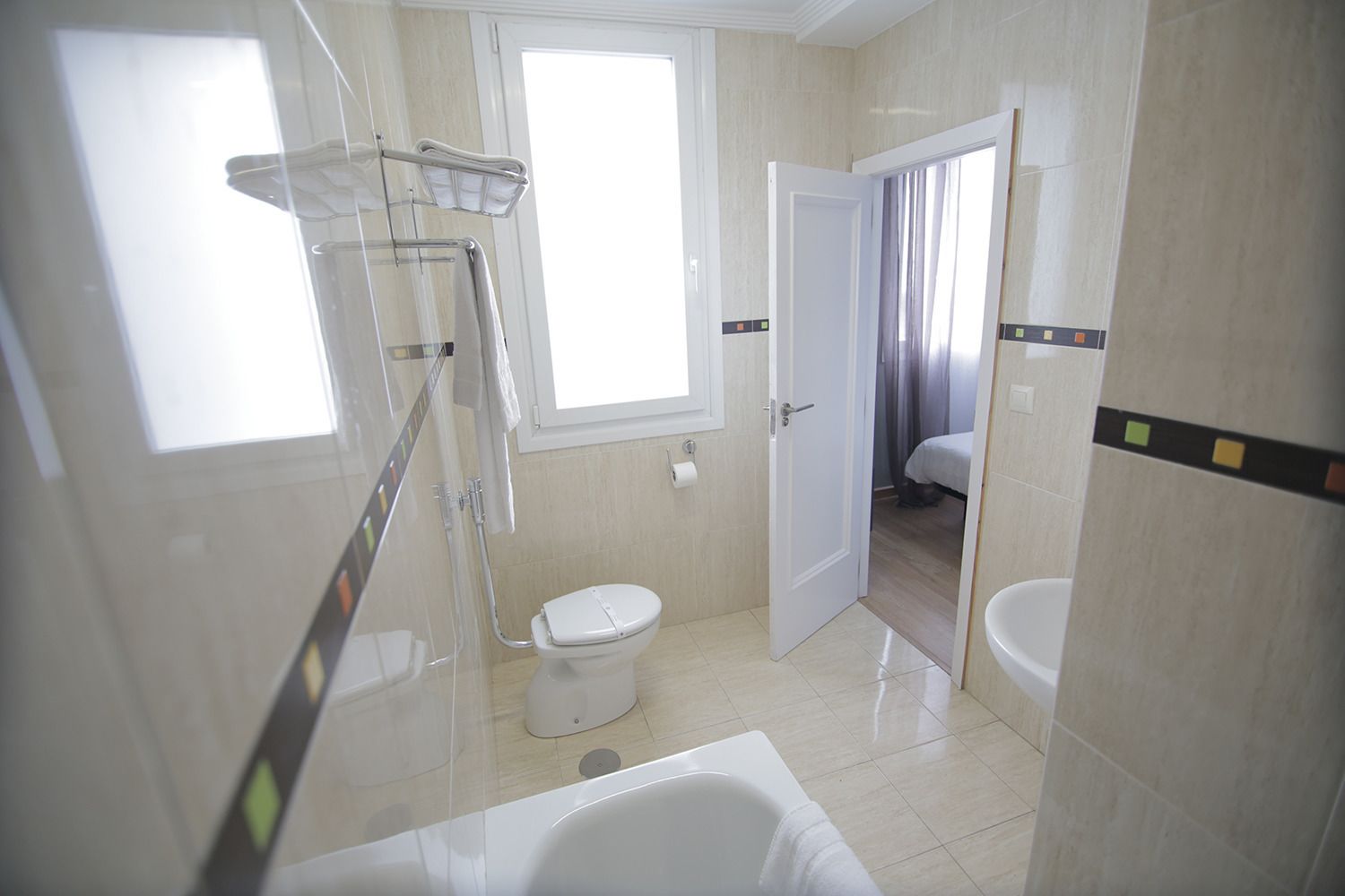 double or twin room | bathroom | hair dryer, towels, soap, toilet paper