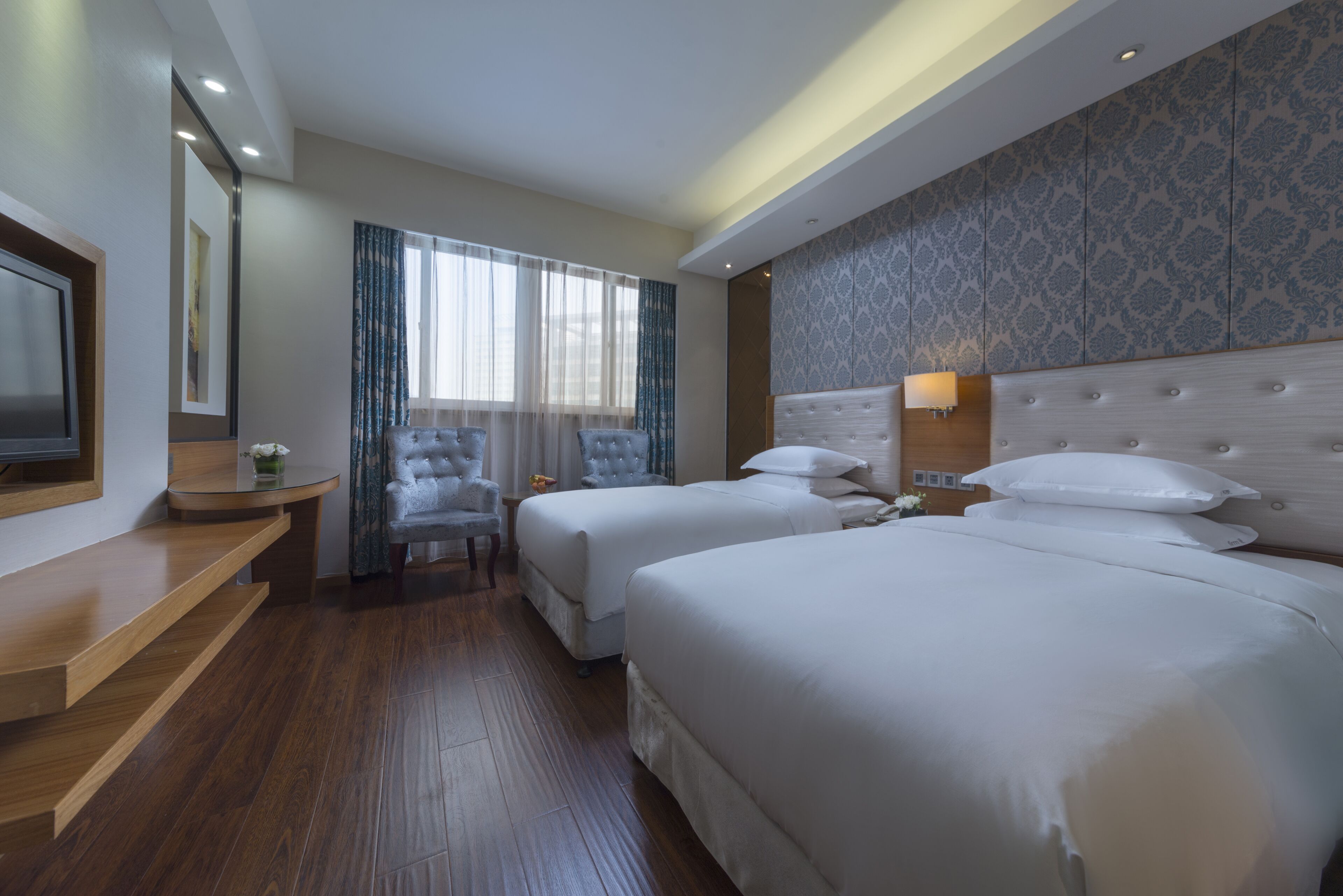 Down comforters, minibar (free items), in-room safe, desk