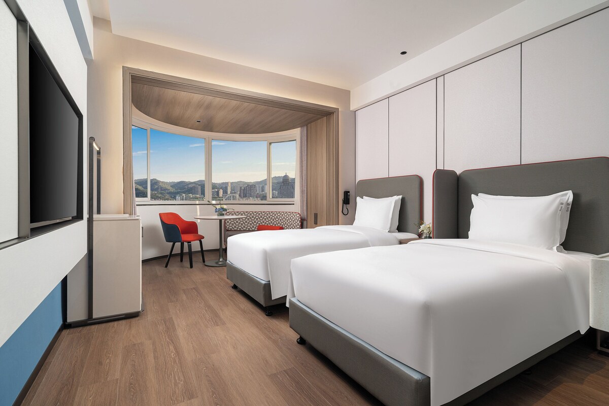 Down comforters, minibar (free items), in-room safe, desk