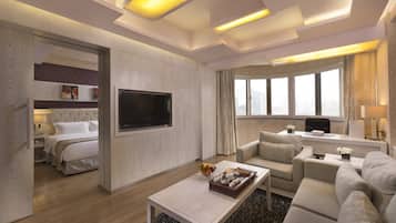 Suite, 1 Queen Bed, Smoking | Down comforters, minibar (free items), in-room safe, desk
