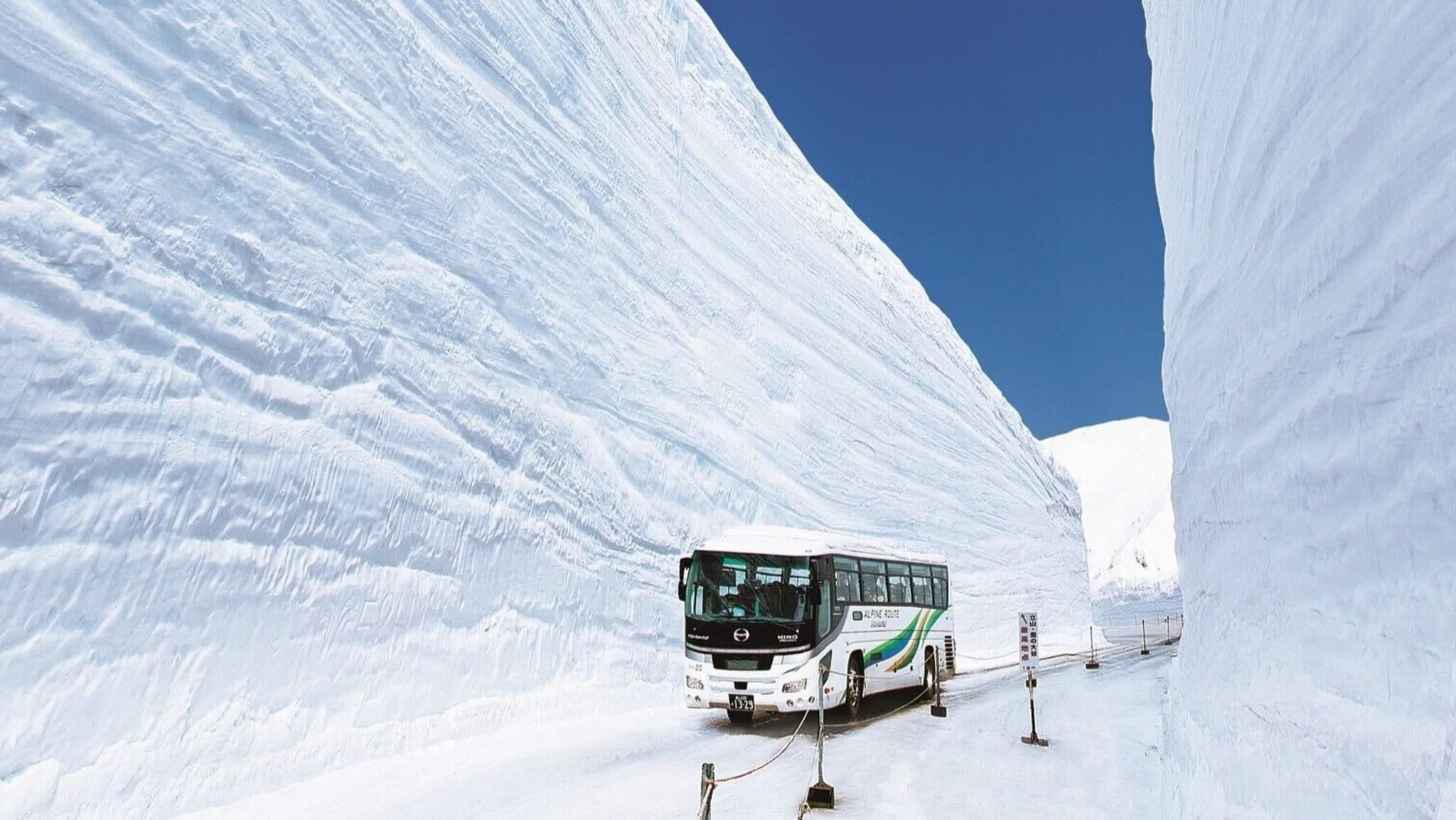 A bus in a snow-covered tunnel.
