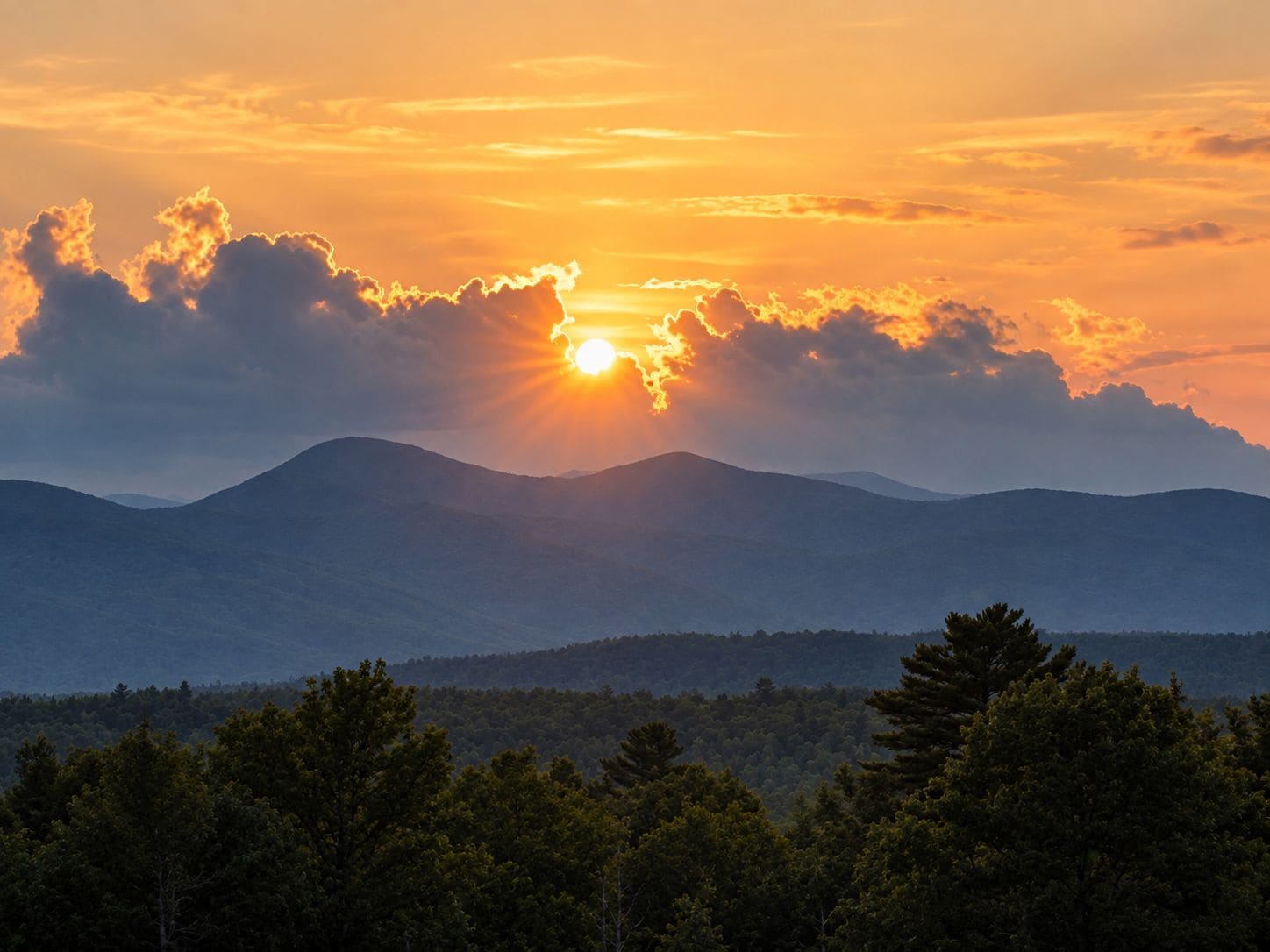 A mountain range with a sunset.