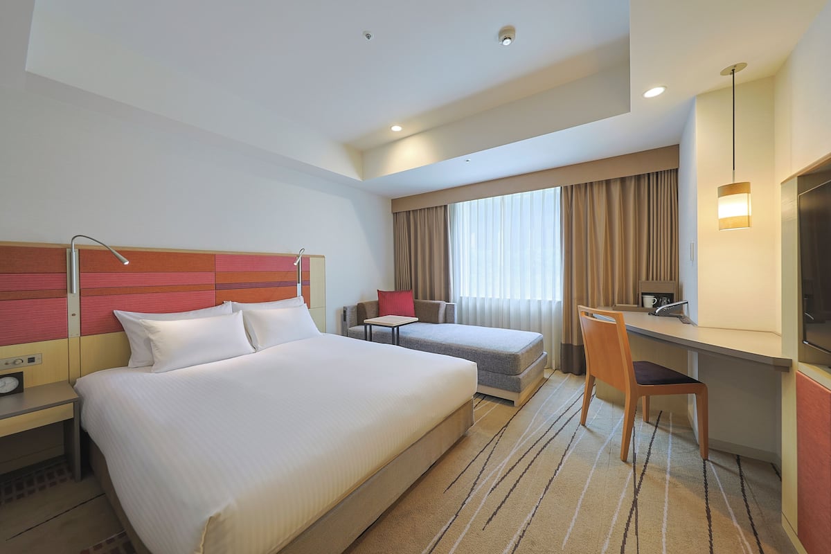 In-room safe, desk, blackout curtains, iron/ironing board (on request)