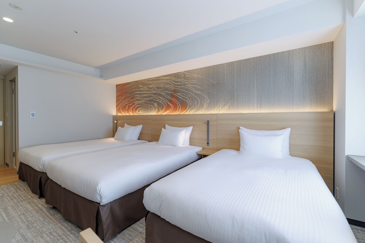 In-room safe, desk, blackout curtains, iron/ironing board (on request)