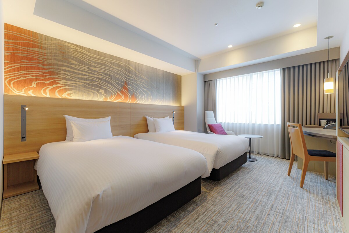 In-room safe, desk, blackout curtains, iron/ironing board (on request)