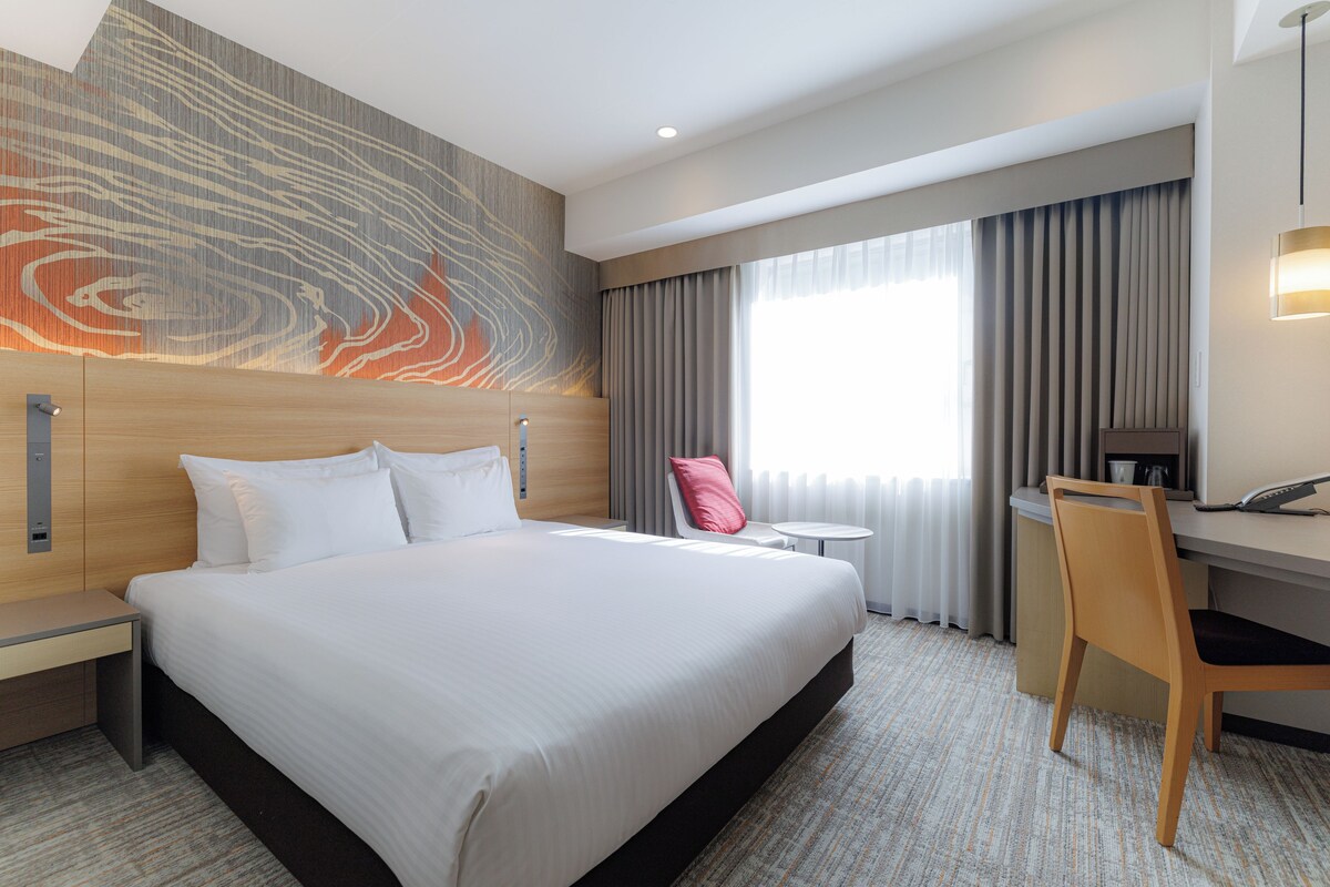 In-room safe, desk, blackout curtains, iron/ironing board (on request)