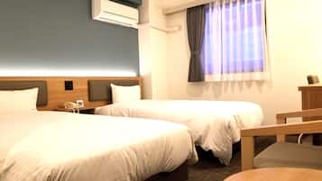 Twin Room, Non Smoking | 1 bedroom, down comforters, in-room safe, desk