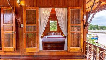Riverfront Villa | Minibar, individually decorated, desk, laptop workspace