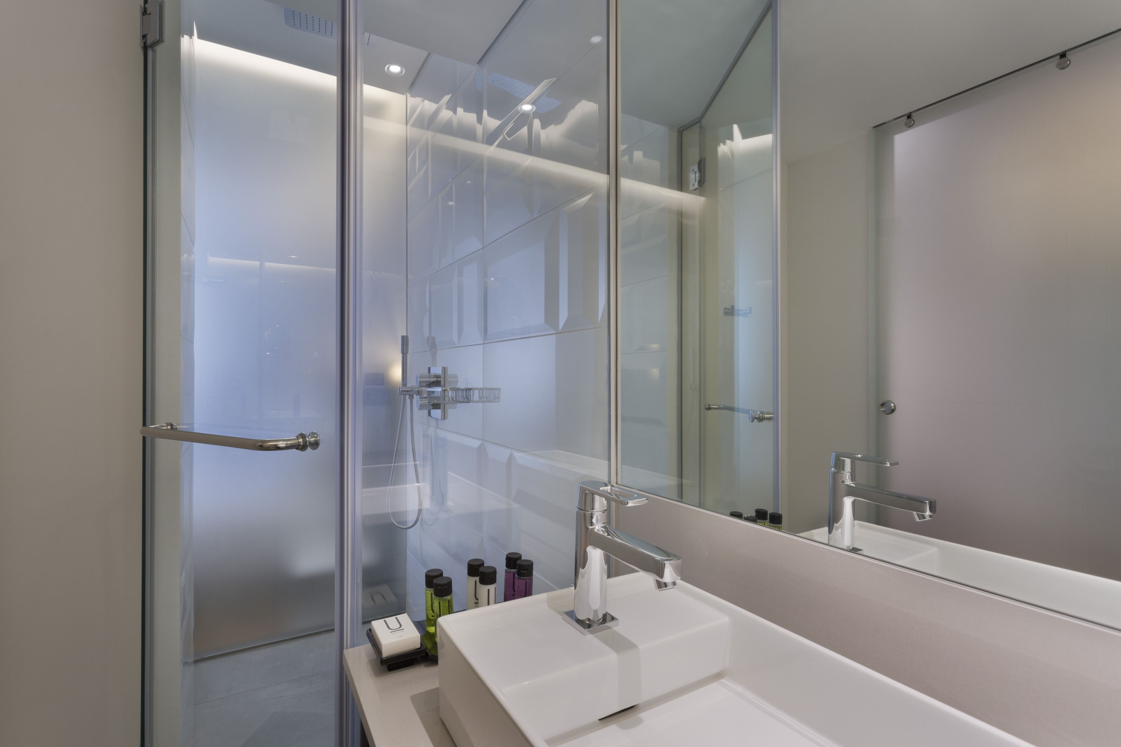 superior room | bathroom | shower, free toiletries, hair dryer, bathrobes