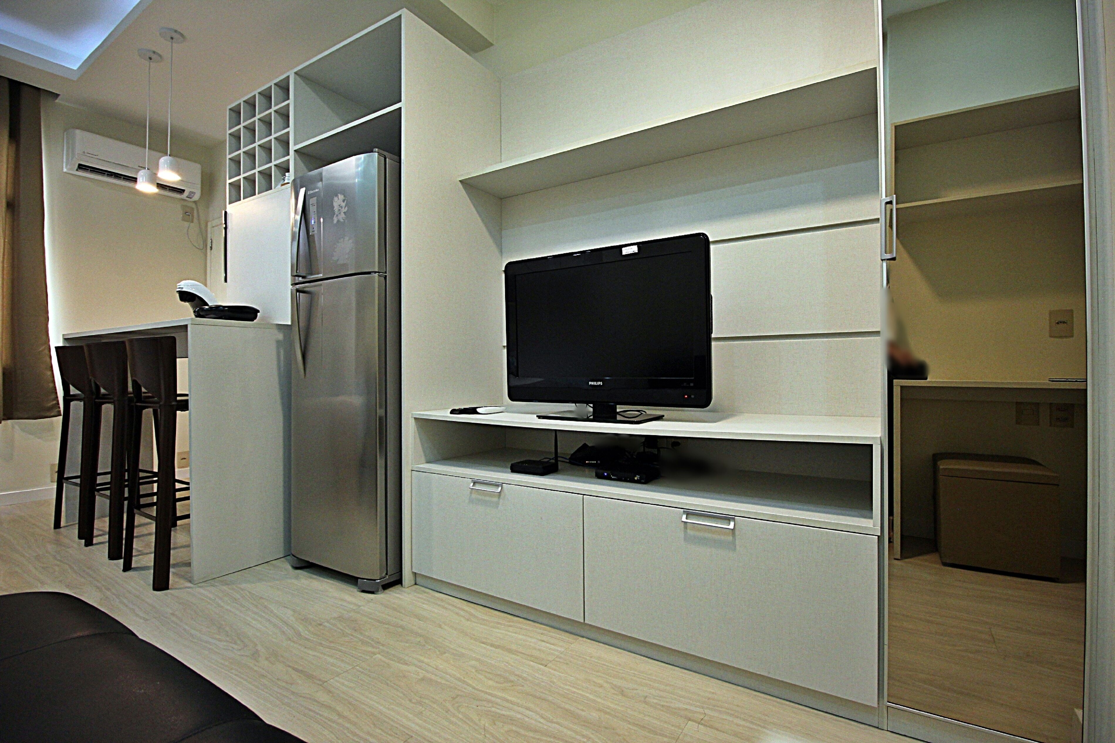 Deluxe Apartment, City View | Living room | Flat-screen TV, pay films
