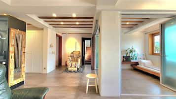 Family Villa, 3 Bedrooms | Living area | 50-inch flat-screen TV with cable channels, TV, heated floors