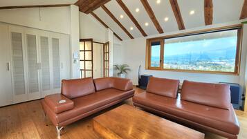 Family Villa, 3 Bedrooms | Living area | 50-inch flat-screen TV with cable channels, TV, heated floors