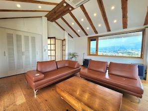 Family Villa, 3 Bedrooms | Living area | 50-inch flat-screen TV with cable channels, TV, heated floors