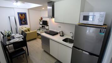 2 Bedroom City View | Private kitchenette | Full-sized fridge, microwave, stovetop, rice cooker