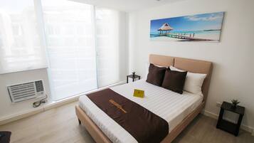 1 Bedroom Beach View  | In-room safe, individually decorated, individually furnished, desk