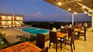 Breakfast, lunch, dinner served; international cuisine, pool views