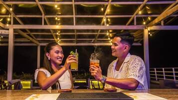 Rooftop bar, ocean views, open daily