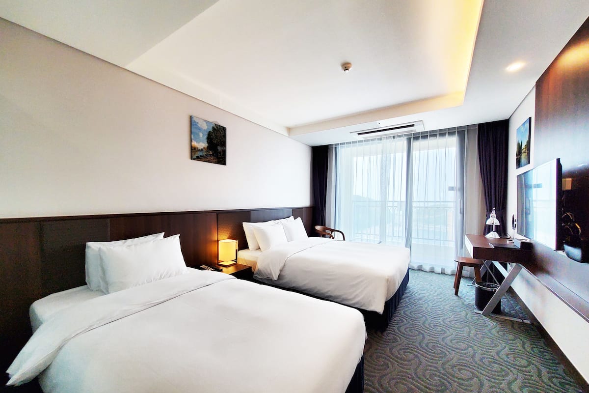Standard Family Twin, Balcony Partial Ocean View | 1 bedroom, desk, laptop workspace, blackout drapes