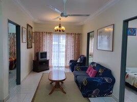 Apartment, 3 Bedrooms | Living area | Flat-screen TV