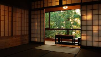 Japanese Executive Room with Beds, Private Open Air Bath | Living area | Flat-screen TV
