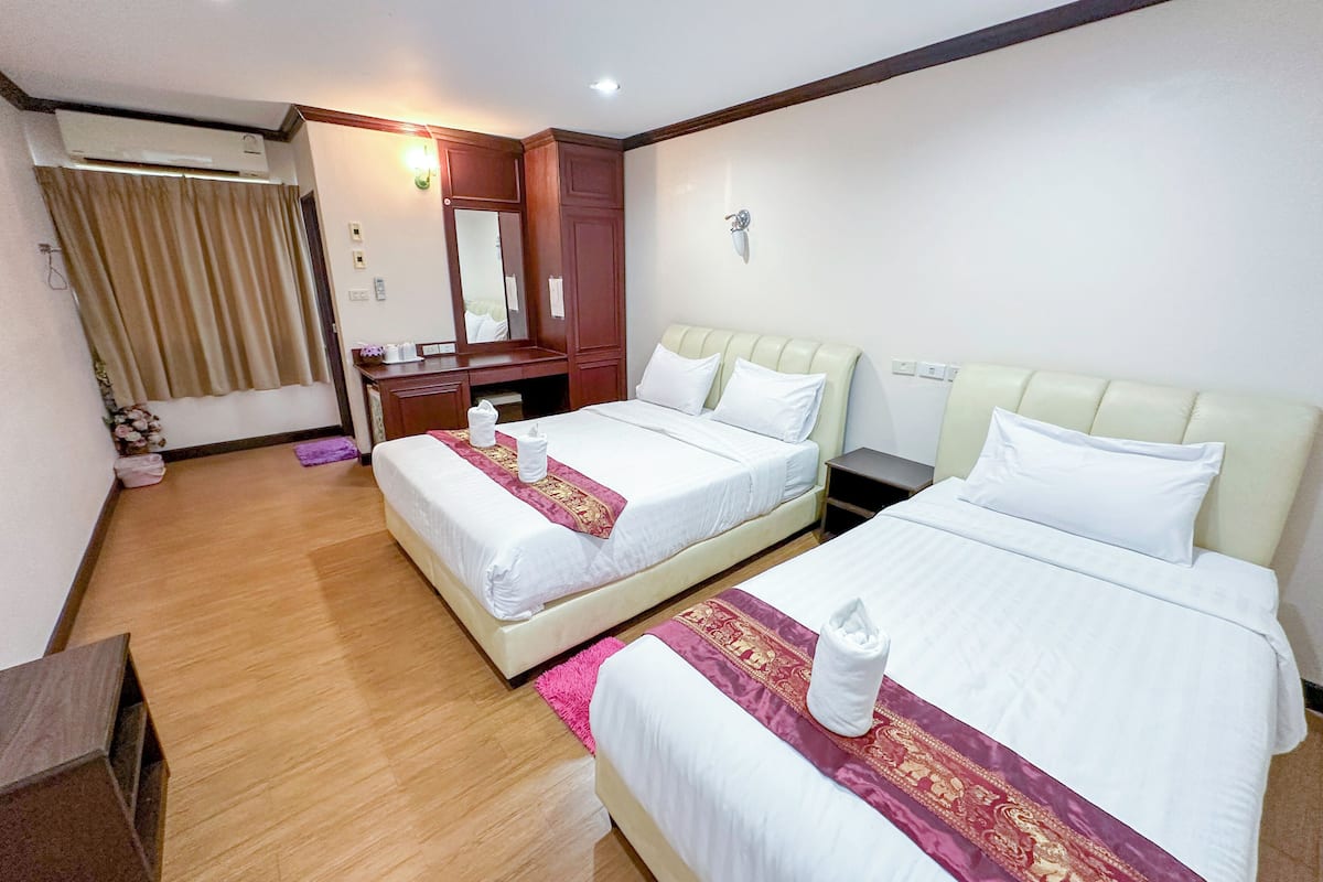 Deluxe kamer, 1 twee- of 2 eenpersoonsbedden | Gratis wifi, beddengoed